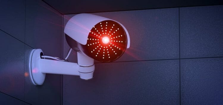a red blinking light coming from a security camera