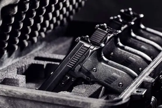 Black handgun in plastic Secure Storage Case