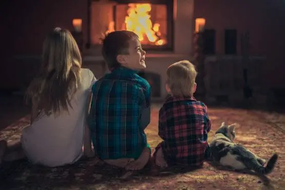 Children By The Fireplace