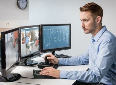 man checking cctv footage