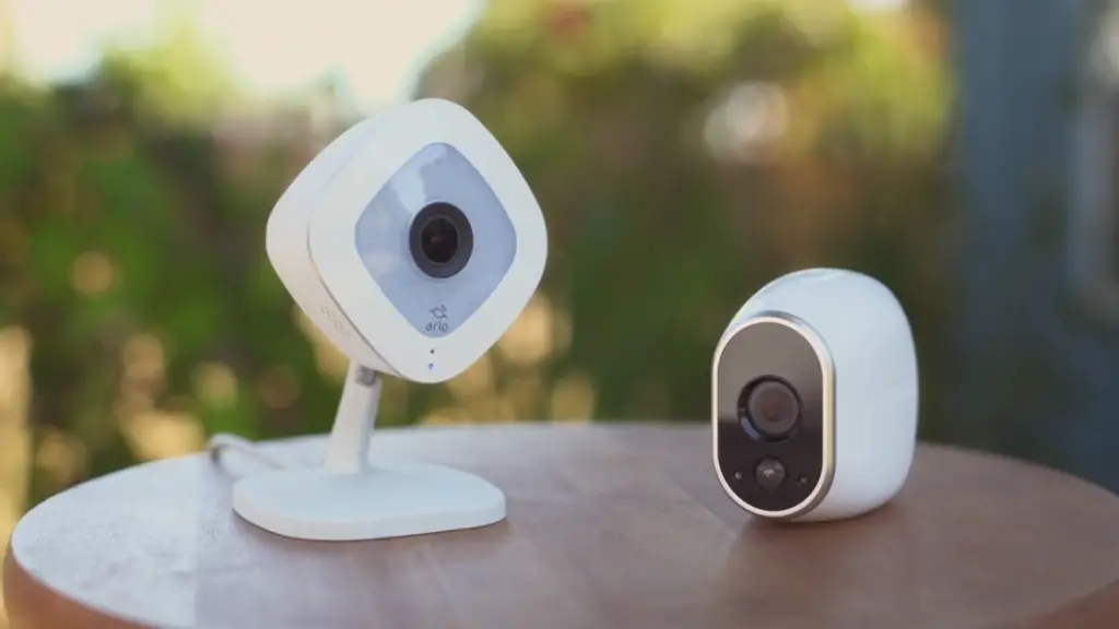 arlo security cameras on the wood table
