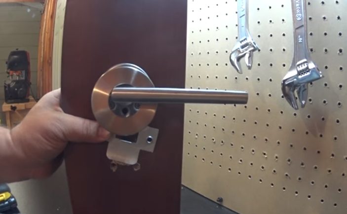 man getting a new lockset