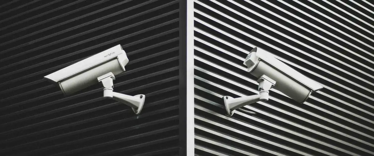 security camera side by side mounted on the wall