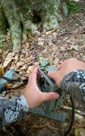 close the lock box with trail camera in it