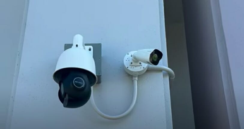 mounted security camera on the wall