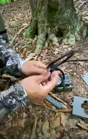 taking the wire antenna of the trail camera first
