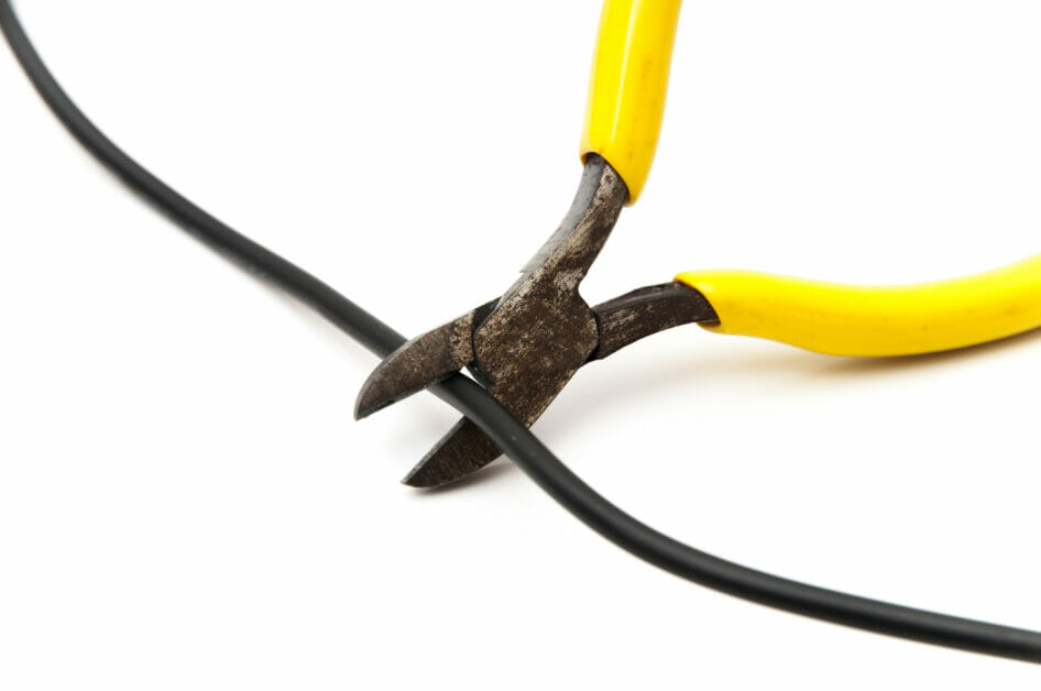 cutting wire with a yellow plier