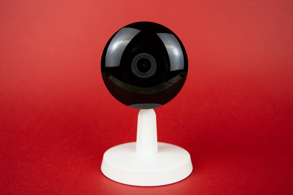 a security camera in a red background