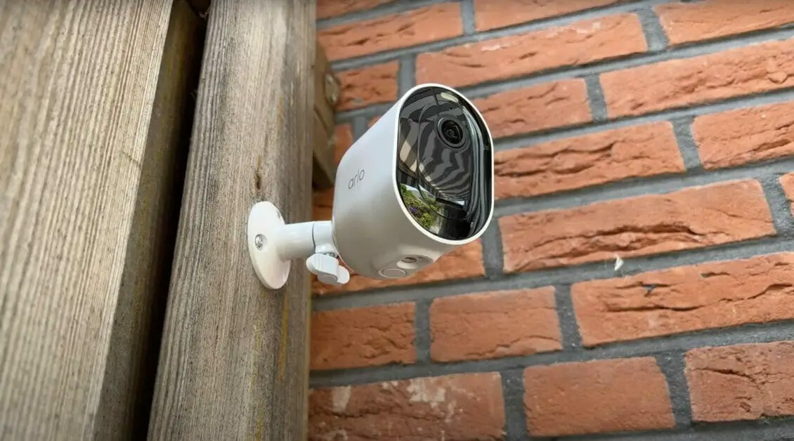arlo security camera mounted at the corner