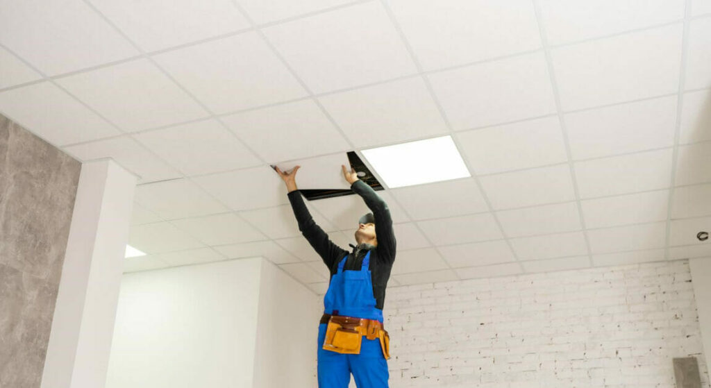 man fixing the ceiling